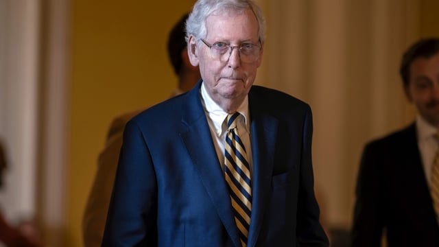 Senate Minority Leader Mitch McConnell, R-Ky., walks to the chamber after a bipartisan group of senators released a highly anticipated bill that pairs border enforcement policy with wartime aid for Ukraine and Israel, at the Capitol in Washington, Monday, Feb. 5, 2024. Senate Republicans have been divided on the bill, but McConnell is committed to the measure. (AP Photo/J. Scott Applewhite)