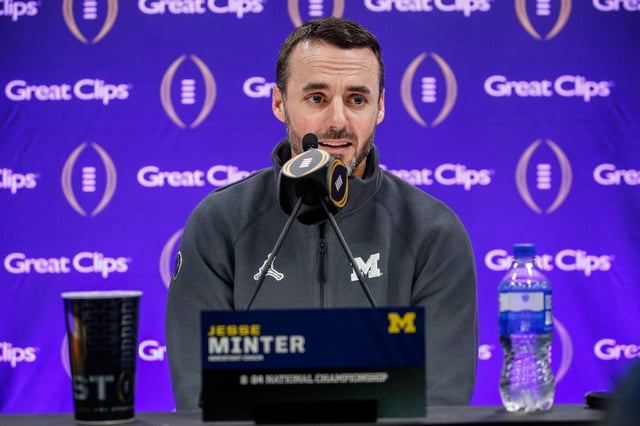 Michigan defensive coordinator Jesse Minter speaks during national championship game media day at George R. Brown Convention Center in Houston, Texas on Saturday, Jan. 6, 2024.