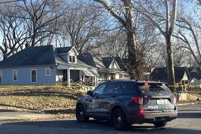 Police and EMS personnel respond to a house in Kansas City, Miss. on Feb. 9, 2024.