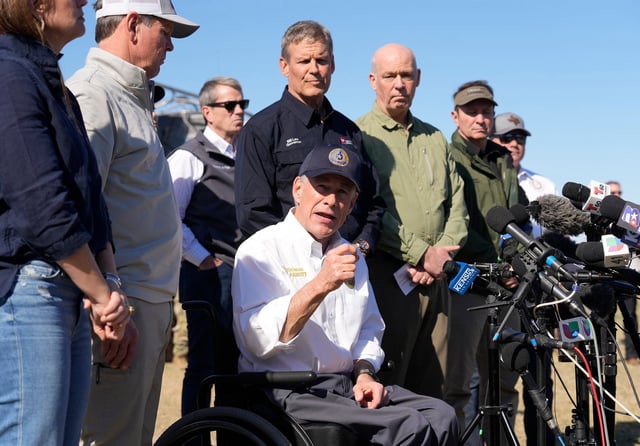 Gov. Greg Abbott, flanked by governors from other states, speaks at a press conference about border policies at Shelby Park in Eagle Pass on Sunday, February 4, 2024. (Credit: Jay Janner/American-Statesman)