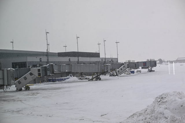 Crews at Buffalo Niagara International Airport scramble to clear runways in Buffalo, New York on Dec. 27, 2022. 