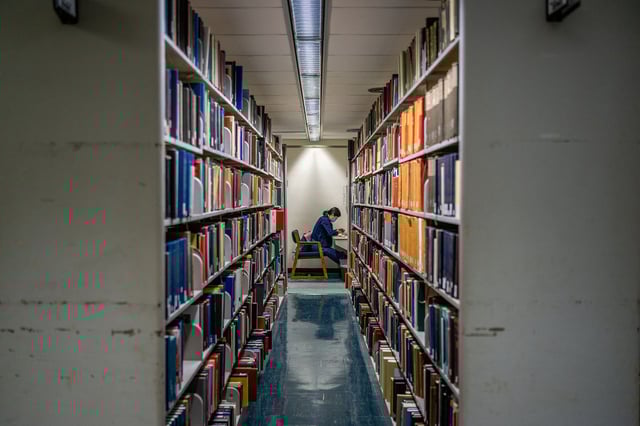 A student reads at the Rice University Library, in Houston, Texas.