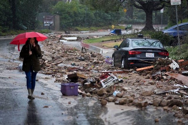 Mud and debris is strewn on a street after a mudslide from an atmospheric river on Monday Feb. 5, 2024, in Studio City, California.