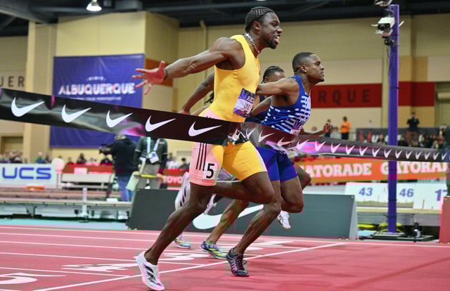 Noah Lyles (left) defeats Christian Coleman by .01 seconds to win the men's 60-meter dash final during the 2024 USATF Indoor Championships in Albuquerque, New Mexico.