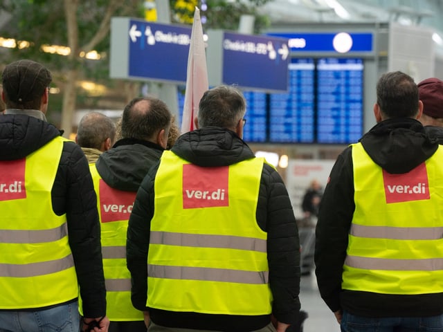 Dozens of Lufthansa ground staff from the Ver.di union are striking at Duesseldorf Airport in Duesseldorf, Germany, on February 7, 2024, as the Ver.di labor union calls for a 27-hour strike at several airports nationwide. (Photo by Ying Tang/NurPhoto via Getty Images)