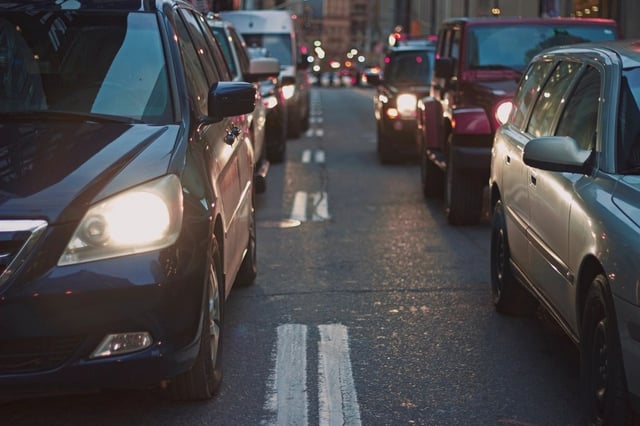 Two rows cars headlights on