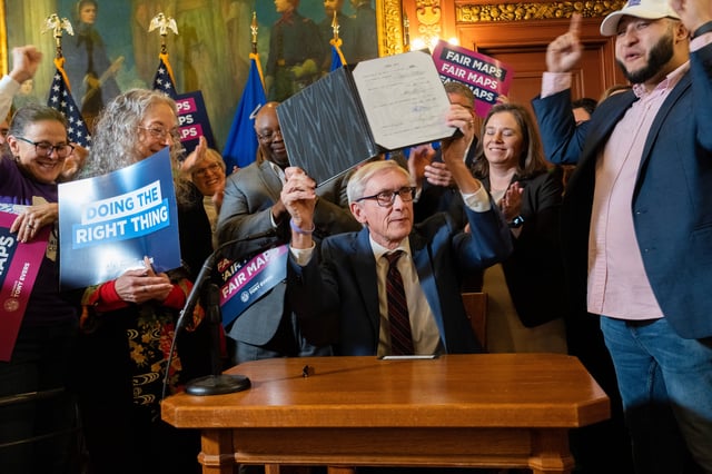 Democratic Gov. Tony Evers signs new legislative maps into law Monday, February 19, 2024, at the Capitol in Madison, Wisconsin. The maps, drawn by the governor's office and approved by the Republican-led Legislature, create new boundaries in races for state Assembly and state Senate that could end more than a decade of lopsided Republican majorities.


Mark Hoffman/Milwaukee Journal Sentinel