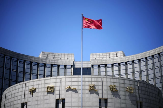 The People's Bank of China in Beijing cut the five-year loan prime rate on Tuesday.