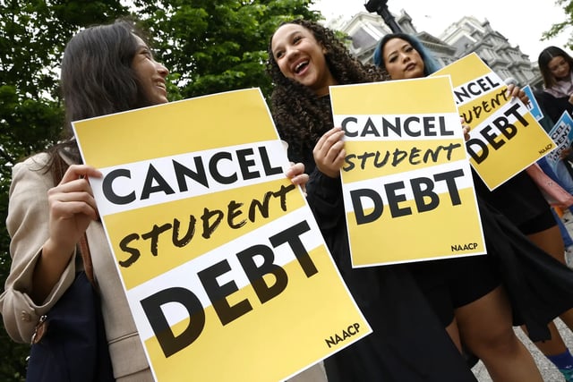 Student loan borrowers gather near The White House to tell President Biden to cancel student debt on May 12, 2020 in Washington, DC.