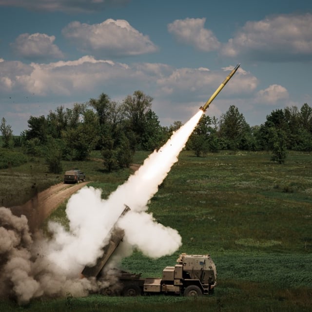A M142 HIMARS launches a rocket on the Bakhmut direction on May 18, 2023 in Donetsk Oblast, Ukraine. Ukrainian forces fired on a training area for Russian troops close to the Donetsk city of Volnovakha with a High Mobility Artillery Rocket System, or HIMARS, on Tuesday, said Serhiy Bratchuk, a Ukrainian official in southern Ukraine.