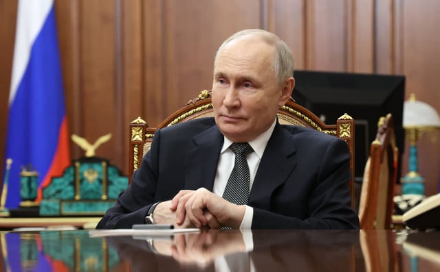 Russian President Vladimir Putin at Kremlin meeting