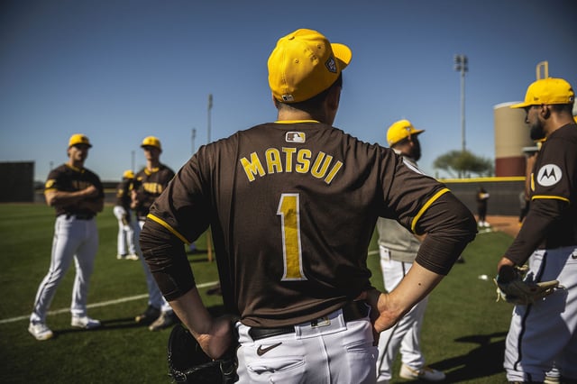 Yuki Matsui #1 of the San Diego Padres stands during the daily workout at Peoria Sports Complex on February 12, 2024 in Peoria, Arizona.