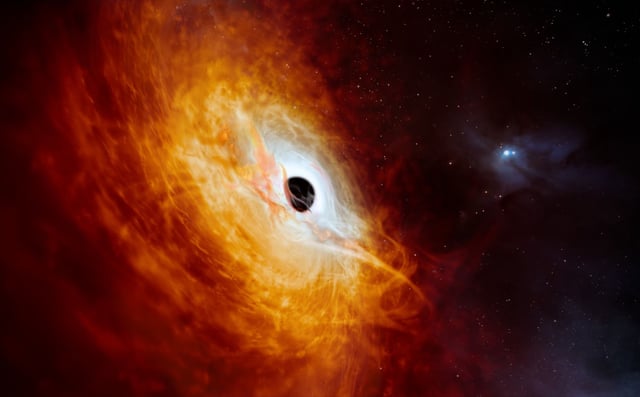 This artistâs impression shows the record-breaking quasar J059-4351, the bright core of a distant galaxy that is powered by a supermassive black hole. Using ESOâs Very Large Telescope (VLT) in Chile, this quasar has been found to be the most luminous object known in the Universe to date. The supermassive black hole, seen here pulling in surrounding matter, has a mass 17 billion times that of the Sun and is growing in mass by the equivalent of another Sun per day, making it the fastest-growing black hole ever known.