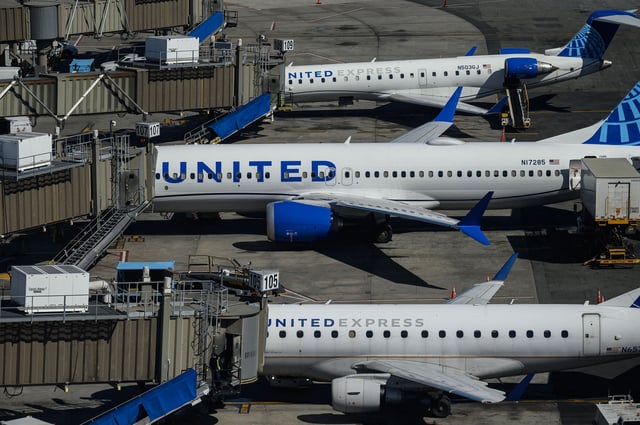 United Airlines aircrafts are parked at Newark Liberty International Airport in Newark, New Jersey, on March 9, 2023. - Airlines and unions disagree on many aspects relating to today's tight labor market, but concur on at least one thing: the need to diversify the pilot workforce pool. (Photo by Ed JONES / AFP) (Photo by ED JONES/AFP via Getty Images)