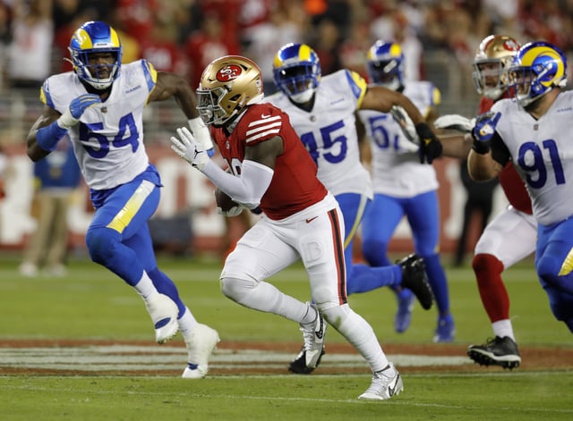 SANTA CLARA, CALIFORNIA - OCTOBER 03: San Francisco 49ers' Deebo Samuel #19 gains yardage in the fourth quarter of their NFL game against the Los Angeles Rams at Levis Stadium in Santa Clara, Calif., on Monday, Oct. 3, 2022. (Jane Tyska/Digital First Media/East Bay Times via Getty Images)
