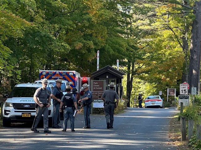 Police secure the entrance to Moreau Lake State Park as search continues for Charlotte Sena, a missing 9-year-old girl who had been camping over the weekend with her family at the park, Monday Oct. 2, 2023, in New York.