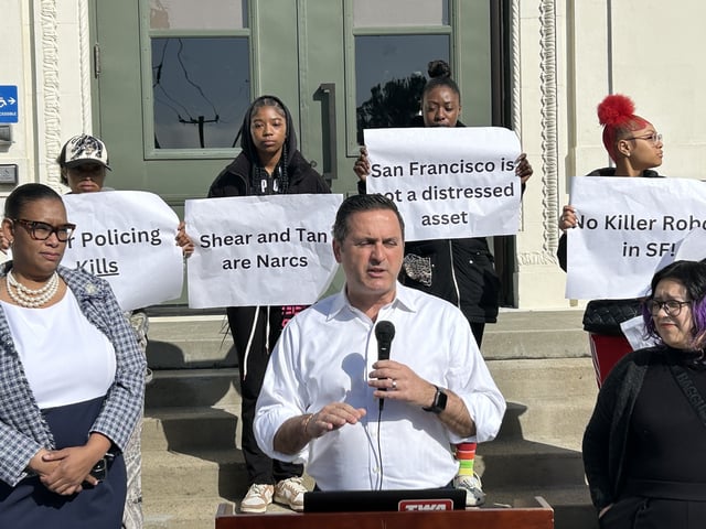 Supervisor Ahsha Safaí spoke against Proposition E at a rally outside tech startup accelerator Y Combinator.