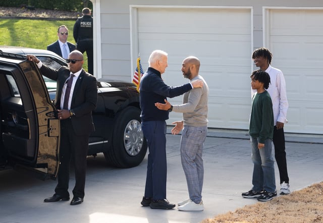 President Joe Biden greets a family for a conversation about student loan debt forgiveness at their home in Raleigh, North Carolina, Jan. 18, 2024, after he touted his economic agenda in a speech at Abbotts Creek Community Center.
