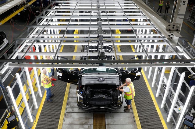 Ford Motor Co. battery powered F-150 Lightning trucks under production at their Rouge Electric Vehicle Center in Dearborn, Michigan on September 20, 2022. (Photo by JEFF KOWALSKY / AFP) (Photo by JEFF KOWALSKY/AFP via Getty Images)