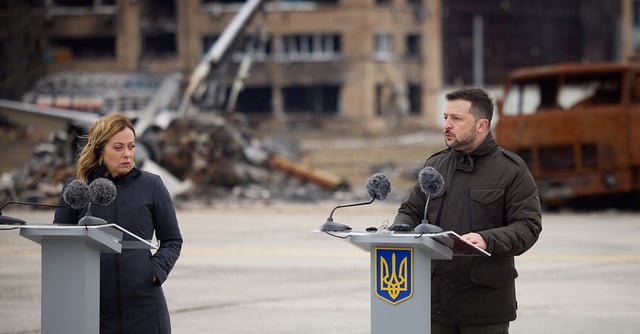 Ukraine's President Volodymyr Zelenskiy speaks during a joint statement with Italian Prime Minister Giorgia Meloni, European Commission President Ursula von der Leyen, Belgium's Prime Minister Alexander De Croo and Canada's Prime Minister Justin Trudeau (not seen) at an airfield in the town of Hostomel, on the second anniversary of Russia's invasion of Ukraine, outside of Kyiv, February 24, 2024. Ukrainian Presidential Press Service/Handout via REUTERS 