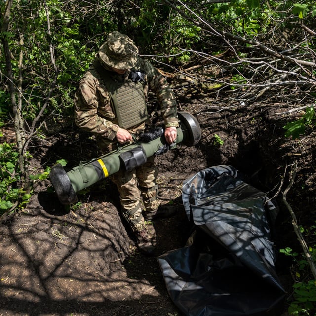A Ukrainian Army soldier places a U.S.-made Javelin missile in a fighting position on the frontline on May 20, 2022 in Kharkiv Oblast, Ukraine. Around half of Western-committed aid to Ukraine does not arrive on time, according to Kyiv, as future security assistance from the country's biggest backer hangs in the balance.
