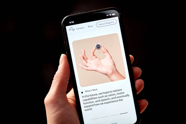 The Neuralink website shows the device that has been implanted in their subject’s brain.. Photo: Bloomberg