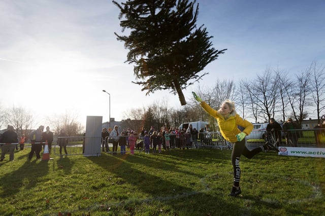 Kamila Grabska, who won the ladies section in the seventh annual Christmas Tree throwing Championships in Ennis, Co Clare, Ireland in 2018.