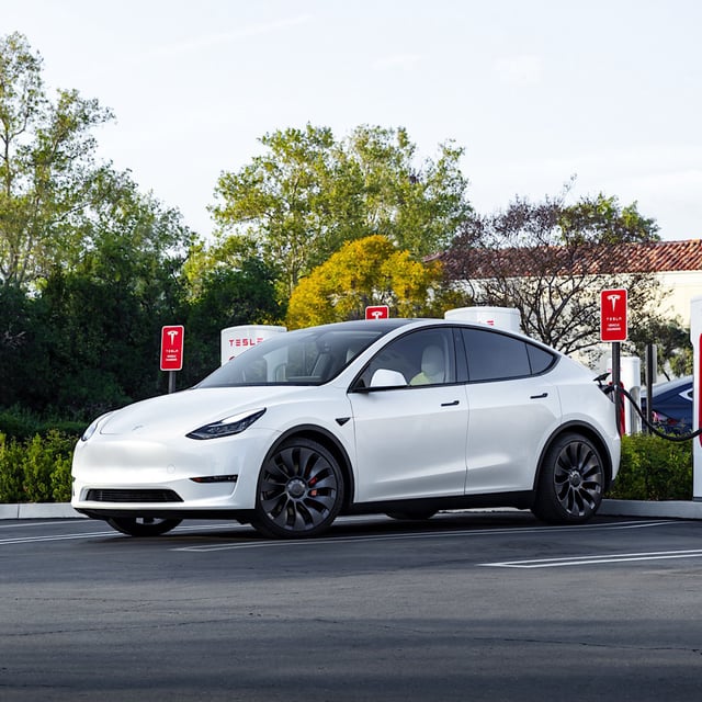 Tesla Model Y at a Supercharger.