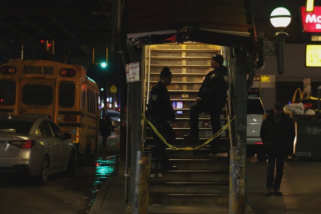 Police block off an entrance to the Mt. Eden Avenue subway station in the Bronx borough of New York after a different shooting February 12.