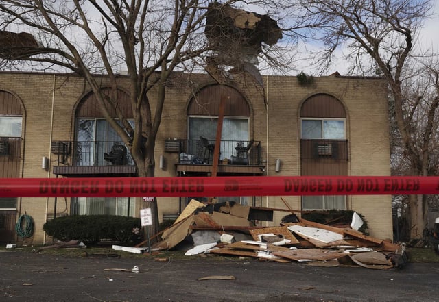 An apartment complex shows significant damages following overnight storms, Wednesday, Feb. 28, 2024, in Mundelein, Illinois. (Stacey Wescott/Chicago Tribune)