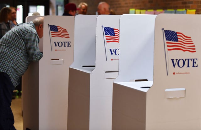 A voter writes in a paper ballot in Wilkes-Barre, Pennsylvania on May 16, 2023.