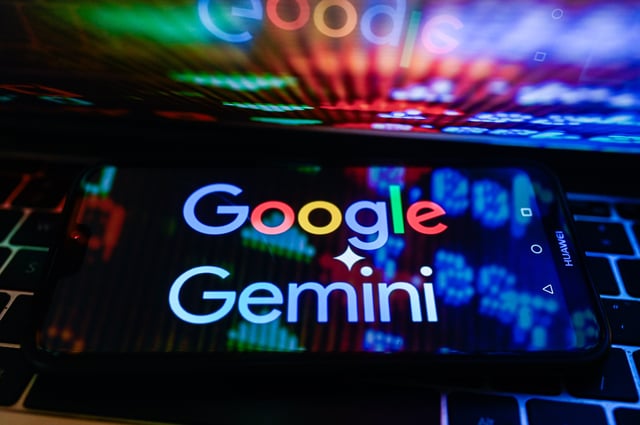 POLAND - 2024/01/03: In this photo illustration, a Google Gemini logo is displayed on a smartphone with stock market percentages in the background. (Photo Illustration by Omar Marques/SOPA Images/LightRocket via Getty Images)