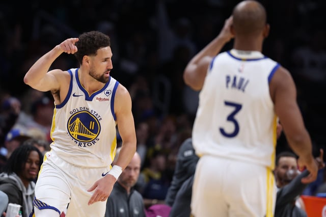WASHINGTON, DC - FEBRUARY 27: Klay Thompson #11 of the Golden State Warriors celebrates against the Washington Wizards during the second half at Capital One Arena on February 27, 2024 in Washington, DC. (Photo by Patrick Smith/Getty Images)