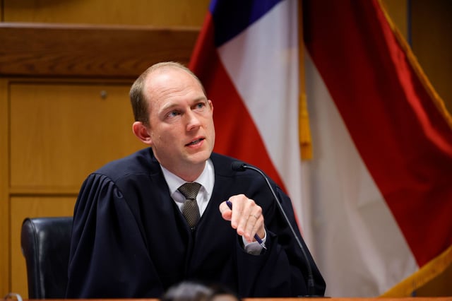 Fulton County Superior Judge Scott McAfee presides over court on Friday in Atlanta. 