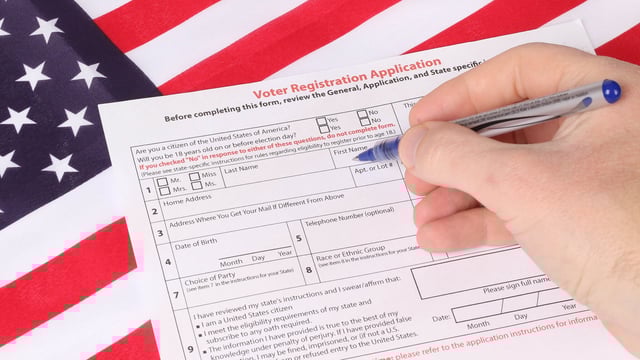 Man fills out Voter Registration application