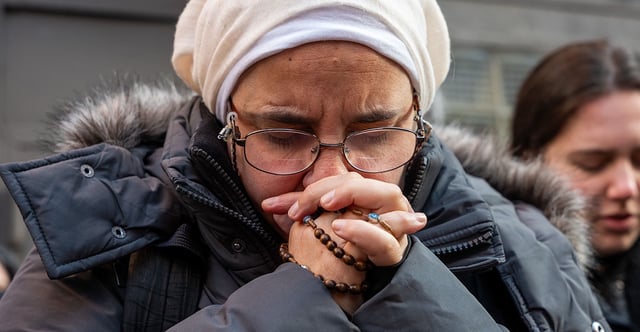 Montana Attorney General Austin Knudsen, a Republican, plans to appeal a state judge's ruling that three laws limiting abortion aren't constitutional. Pictured: An anti-abortion activist prays near an abortion rights rally Feb. 3 outside a Planned Parenthood clinic in downtown Manhattan. (Photo: Spencer Platt/Getty Images)
