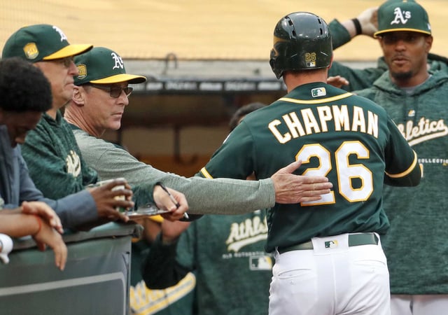 Matt Chapman and Bob Melvin, second from left, were together with the A’s, and are now reunited with the Giants.