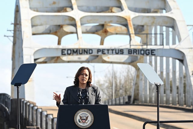 US Vice President Kamala Harris speaks at the Edmund Pettus Bridge during an event to commemorate the 59th anniversary of "Bloody Sunday" in Selma, Alabama, on March 3, 2024. On March 7, 1965, civil rights marchers crossed the Edmund Pettus Bridge and clashed with state police who used batons and tear gas to disperse the protesters. (Photo by SAUL LOEB / AFP) (Photo by SAUL LOEB/AFP via Getty Images)