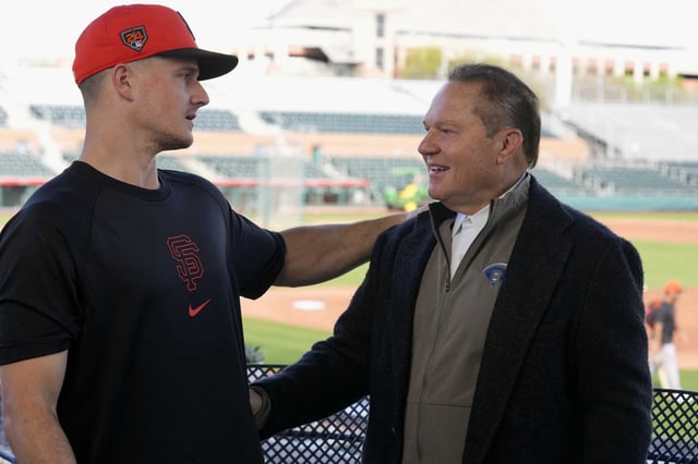 New Giants infielder Matt Chapman, left, talks with his agent Scott Boras after a news conference in Scottsdale, Ariz., announcing Chapman’s signing.