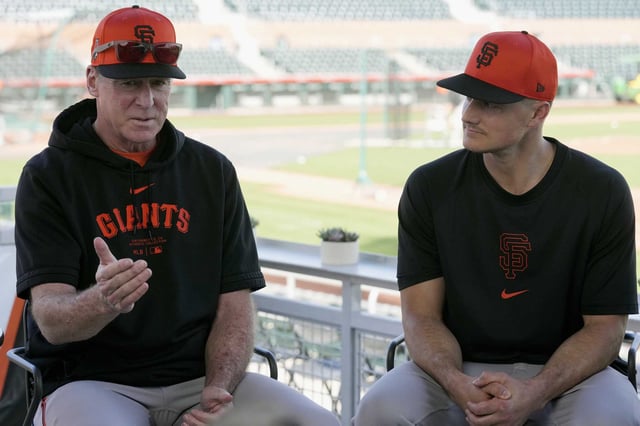 Giants manager Bob Melvin, left, talks about new third baseman Matt Chapman at a news conference announcing his signing in Scottsdale, Ariz. The two spent five seasons together with the Oakland A’s.