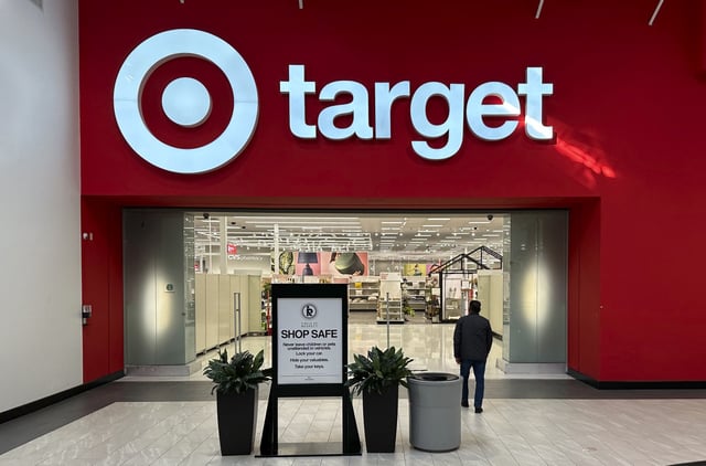 A person heads into a Target store Thursday, Jan. 11, 2024, in Lakewood, Colo. The company is slated to announce fourth-quarter financial results on Tuesday, March 5, 2024, hours before it holds its annual meeting with investors and analysts. The results and executive comments should offer more clues on shopper behavior in a still tough economic environment. (AP Photo/David Zalubowski, File)