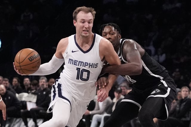 Luke Kennard helped drive the Grizzlies past Dorian Finney-Smith and the Nets Monday night at Downtown's Barclays Center. AP Photo by Frank Franklin II