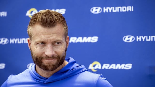 Los Angeles Rams head coach Sean McVay listens to questions from the members of media.