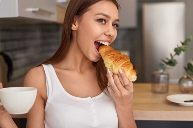 Eating croissant