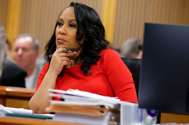 Fulton County District Attorney Fani Willis looks on during a hearing on the Georgia election interference case, Friday, March, 1, 2024, in Atlanta.
