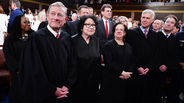Chief Justice John Roberts, from front row left, Justice Sonia Sotomayor, Justice Elena Kagan, Justice Neil Gorsuch, Justice Brett Kavanaugh, and in back row left, Justice Ketanji Brown Jackson, arrive before President Joe Biden delivers the State of the Union address to a joint session of Congress at the Capitol on March 7, 2024.