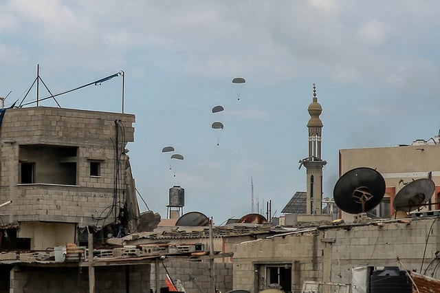 Aid is airdropped into Gaza