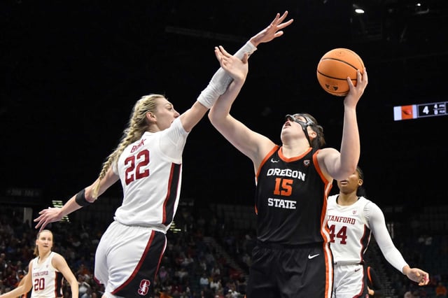 Oregon State forward Raegan Beers (15) shoots against Stanford forward Cameron Brink (22) during the first half in the semifinals of the Pac-12 women’s tournament Friday in Las Vegas. 