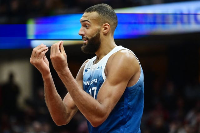 Mar 8, 2024; Cleveland, Ohio, USA; Minnesota Timberwolves center Rudy Gobert reacts after fouling out against the Cleveland Cavaliers.