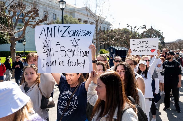 About 200 students, faculty and other supporters marched at UC Berkeley Monday to highlight concerns about antisemitism on campus following a violent incident that canceled a speech by a prominent Israeli lawyer last month. 